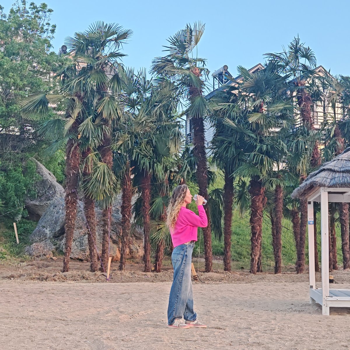 Woman enjoys casual beach afternoon in Ukrainian coastal village