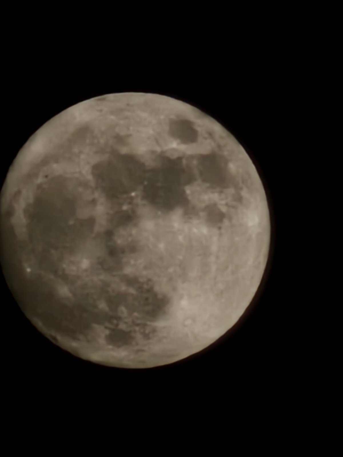 Moon's surface details photographed from Holywell, UK