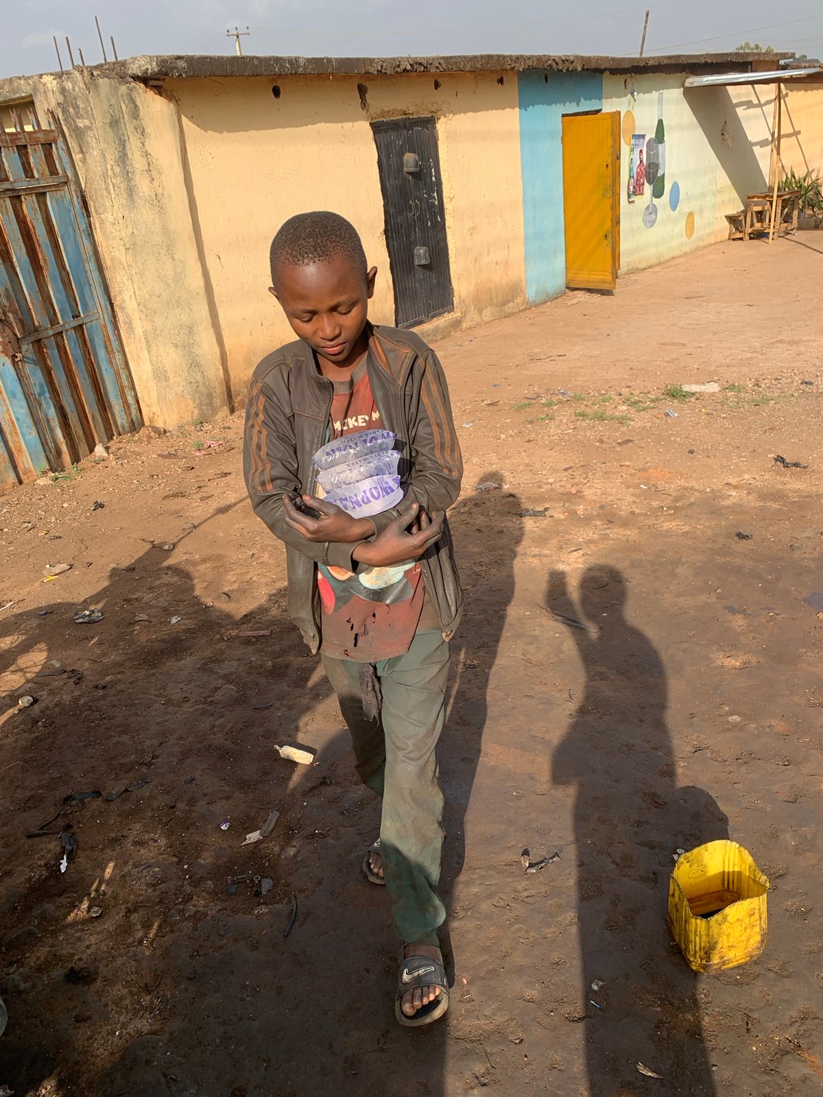 Motorcycle repair work documented in Gura Top, Nigeria