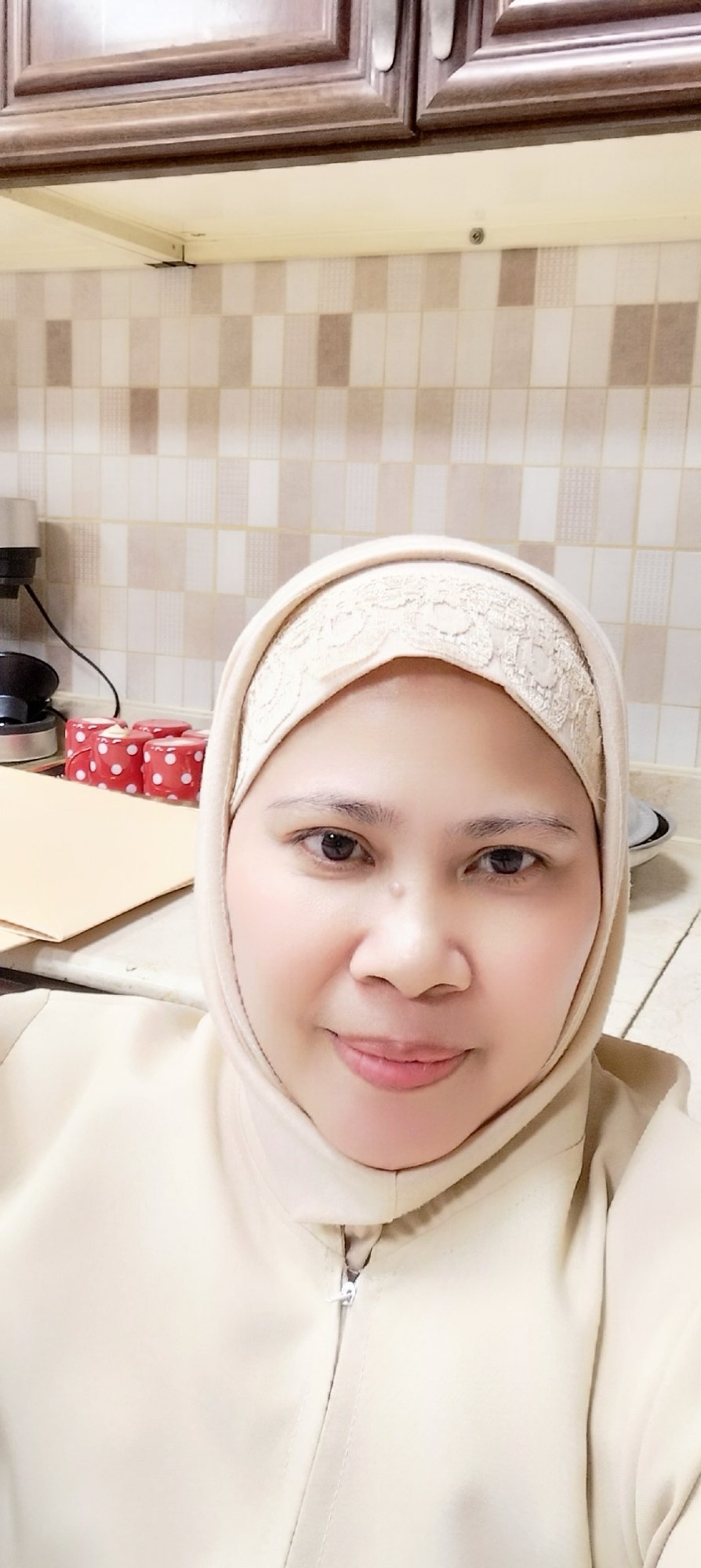 Relaxed kitchen moment with a teapot on the stove