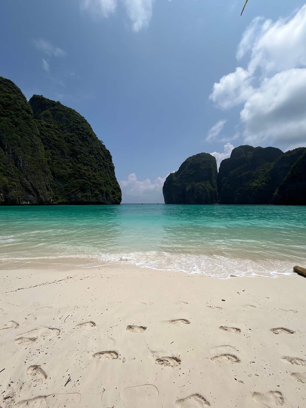 Morning at Maya Bay: crowds, cliffs, and turquoise water