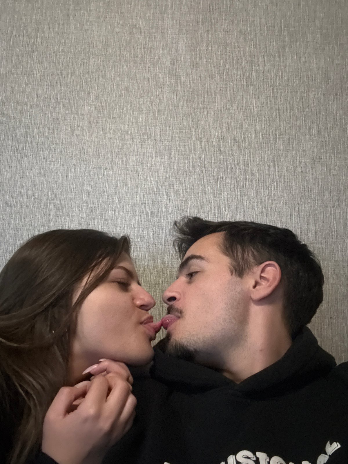 Intimate moment captured between couple in Sofia apartment