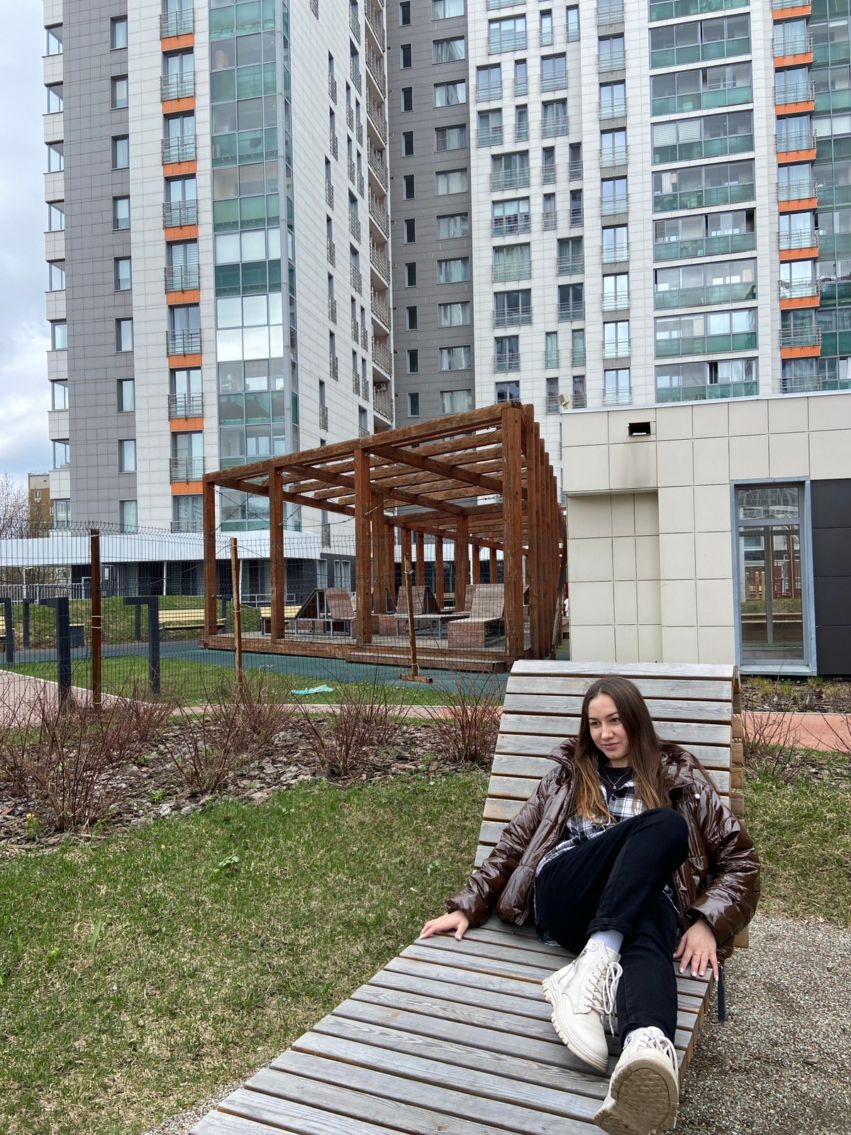Woman photographed in casual urban photoshoot across Izhevsk parks
