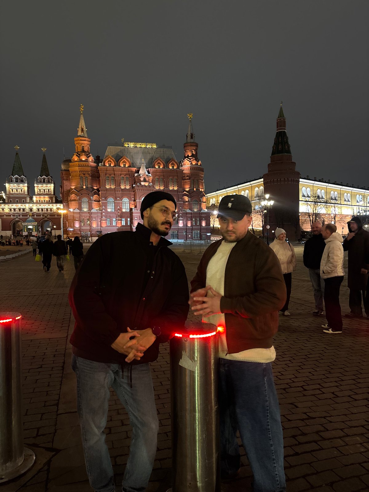 Two men photographed in Moscow square near Historical Museum