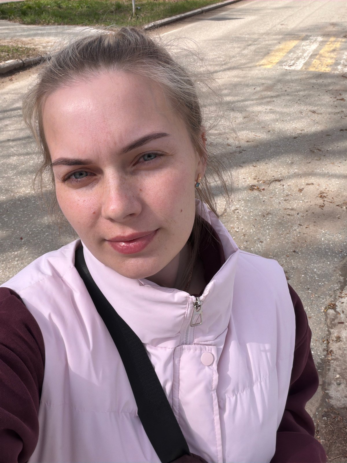 Young woman documents daily life through selfies in Chaikovsky