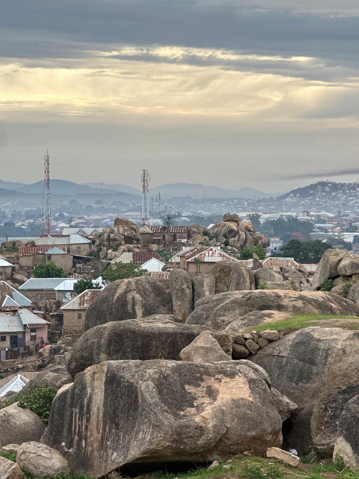 Dawn panoramic views captured across Jos, Nigeria's rocky urban landscape
