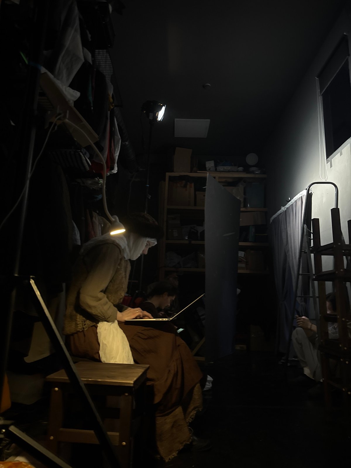 Moscow residents captured in cluttered room, one lying down