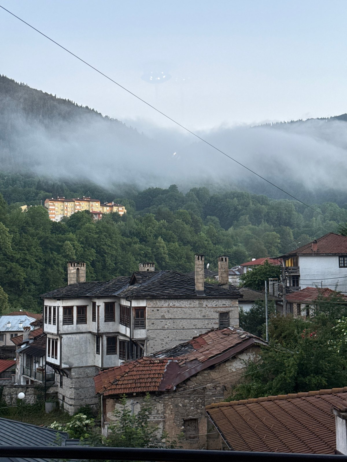 Evening views capture misty mountain city Smolyan, Bulgaria