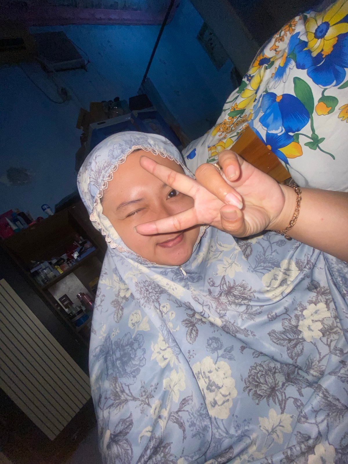 Casual home moments in Gelam: selfies and kids at play