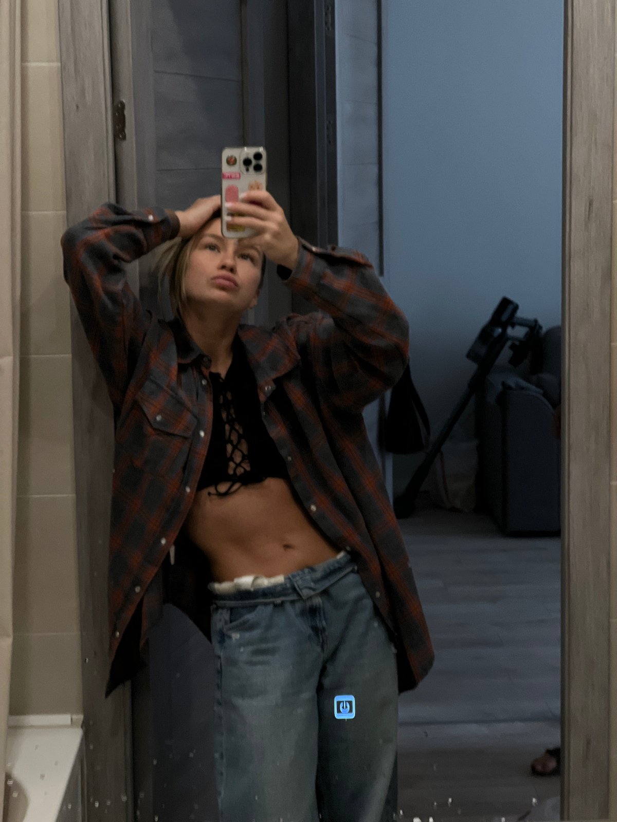 Person takes bathroom selfie in Svkh Voronezhskiy, Russia
