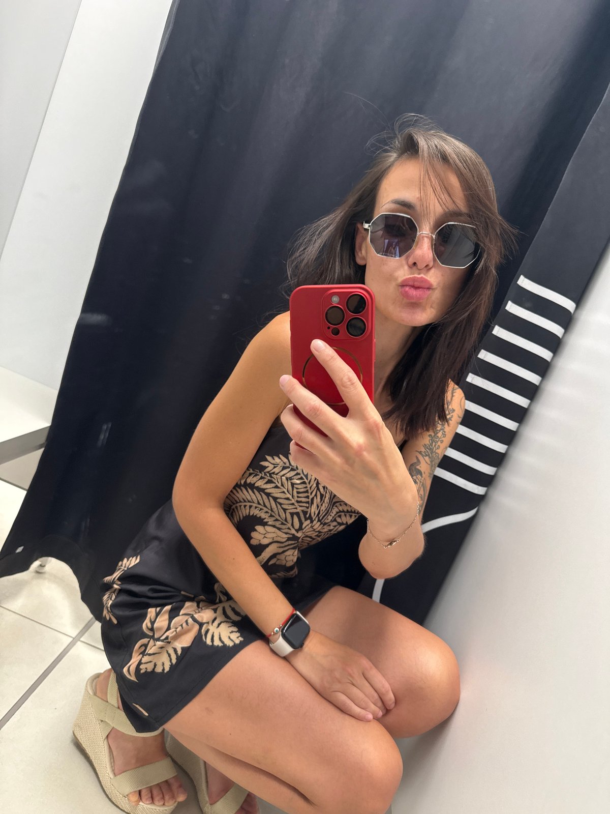Woman takes multiple fitting room selfies in Pleven, Bulgaria