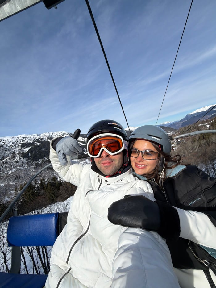 Couples document ski vacation moments in Les Allues, France