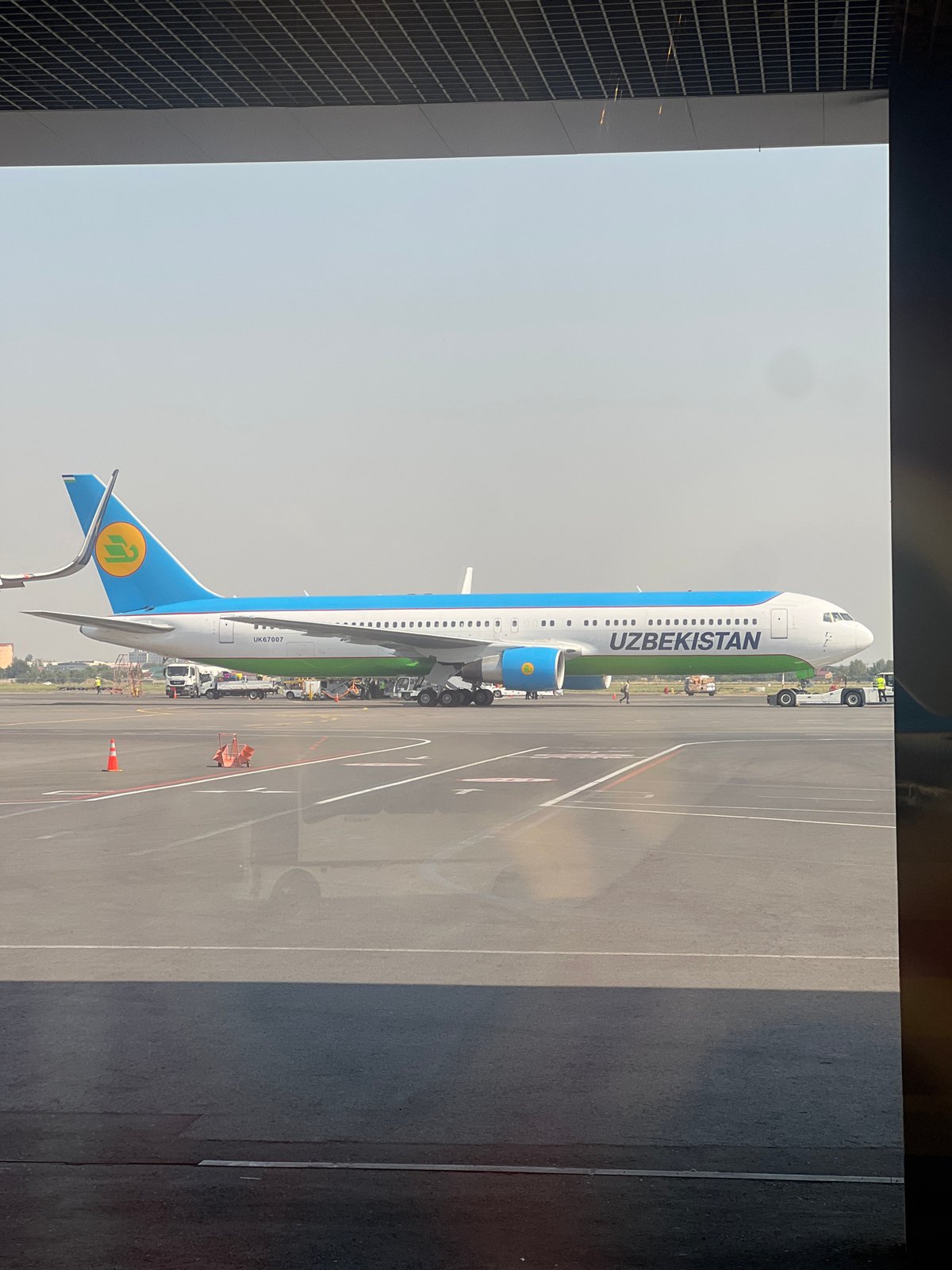 Aircraft on the tarmac and crafts in the shops of Tashkent