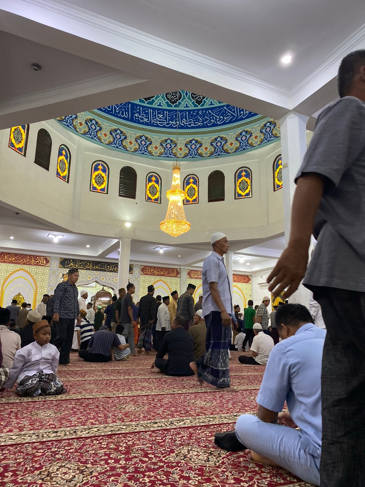 Friday prayers at Lhokseumawe mosques, with snapshots of local life