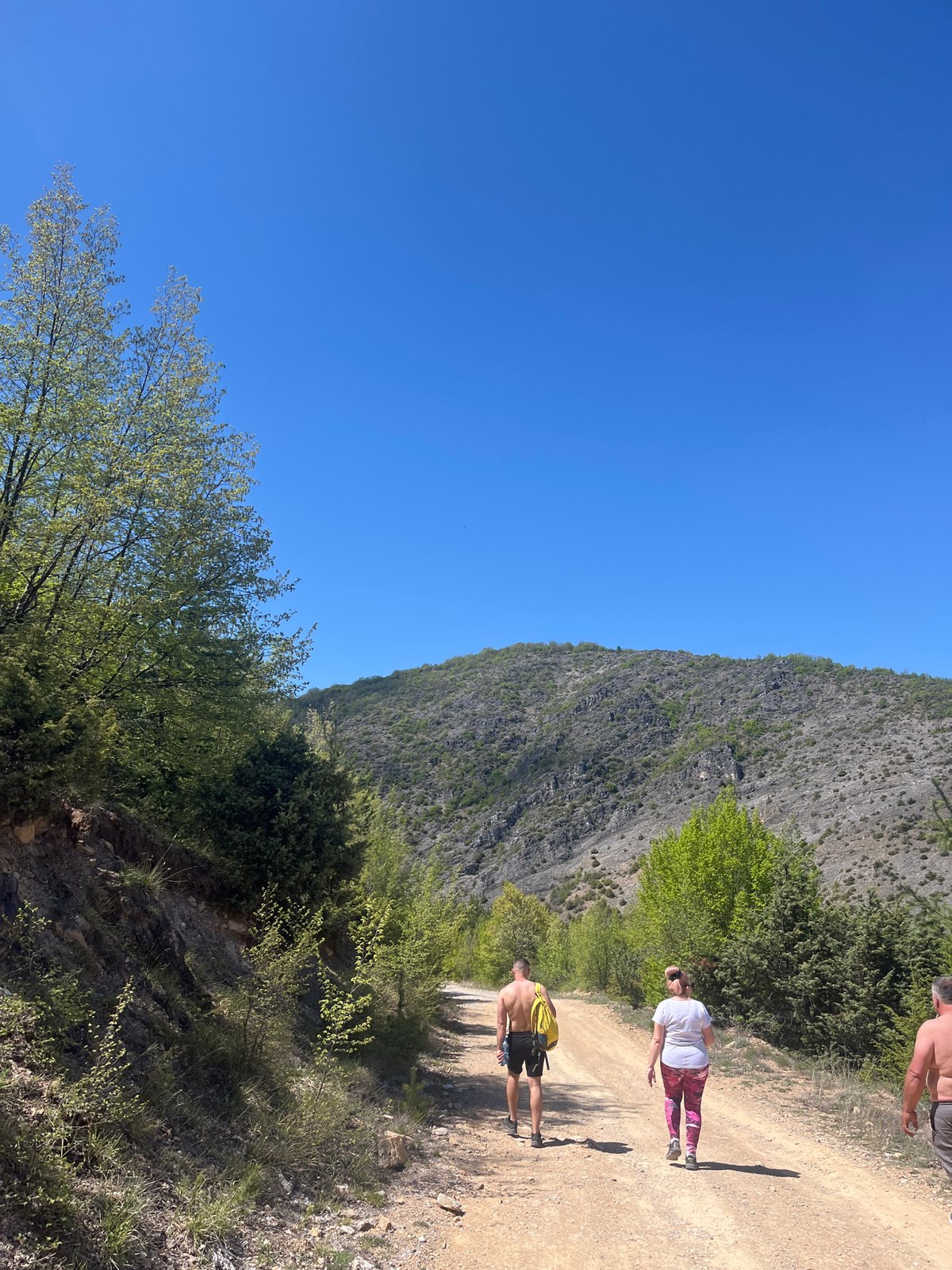 Hikers explore mountain trails near Polska Skakavitsa, Bulgaria