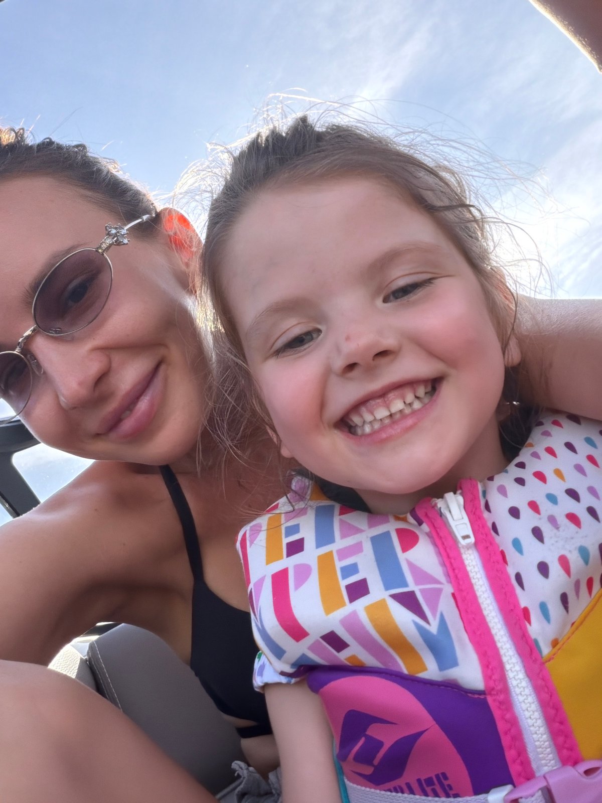 Woman, child enjoy wakeboarding outing in Терехово, Russia