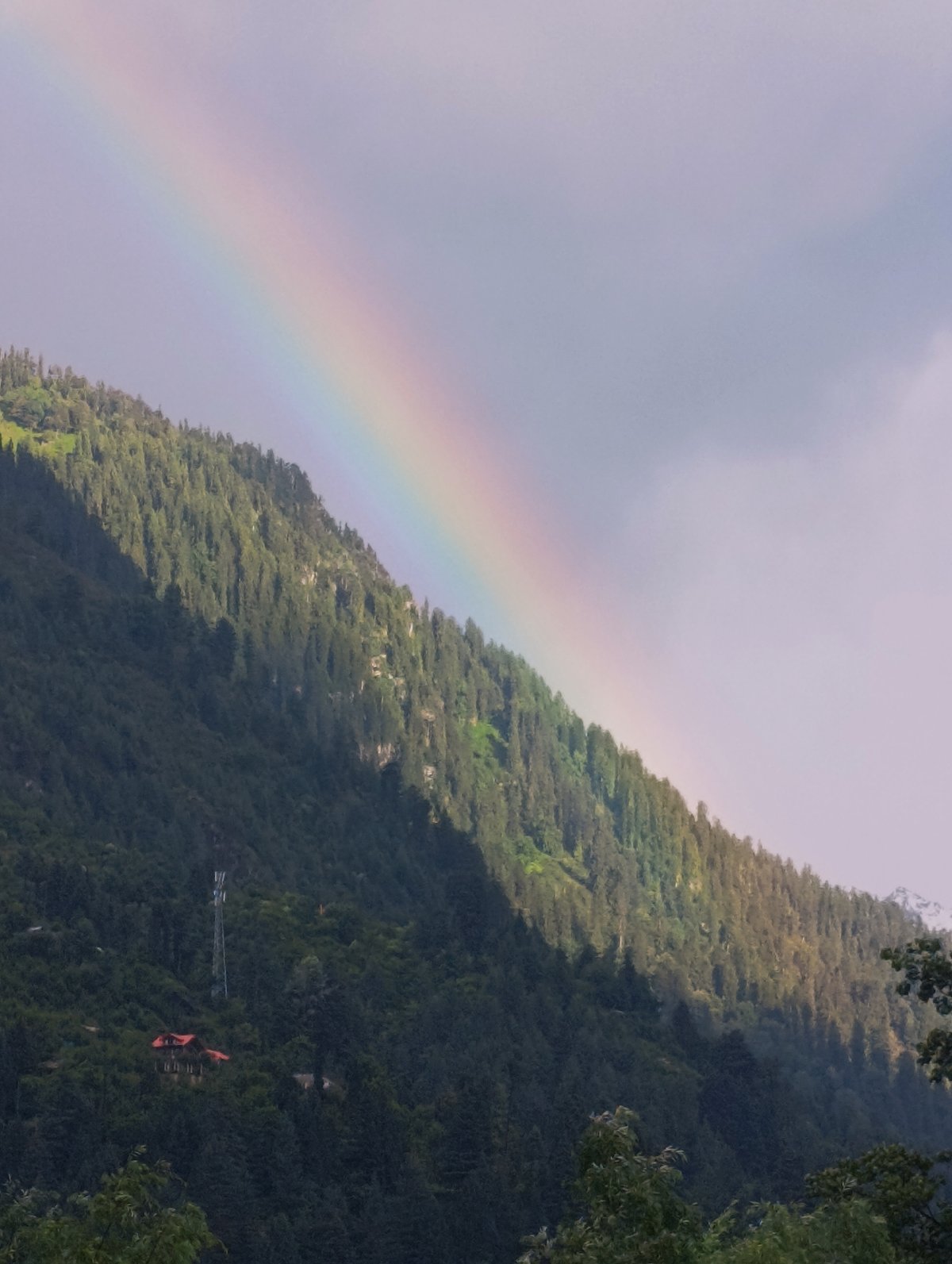 Rainbow over Himalayan mountains near Bahang, India