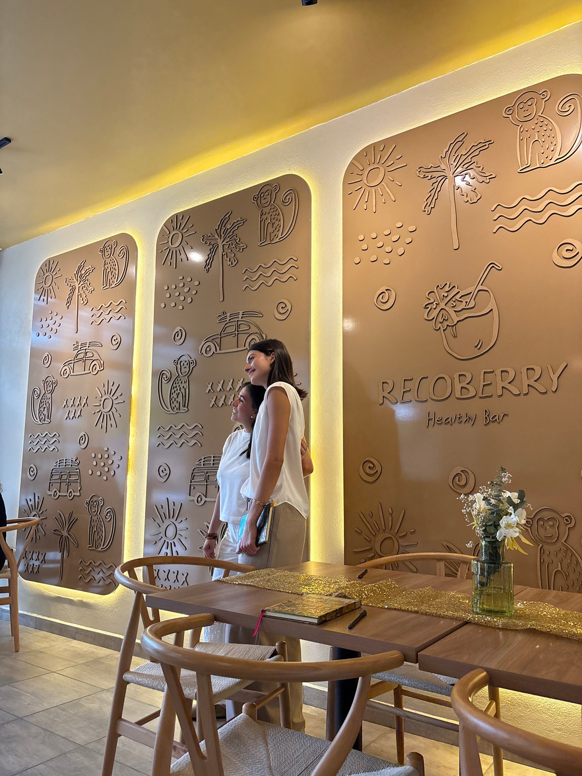 Diners write in notebooks at decorated Mexican health bar