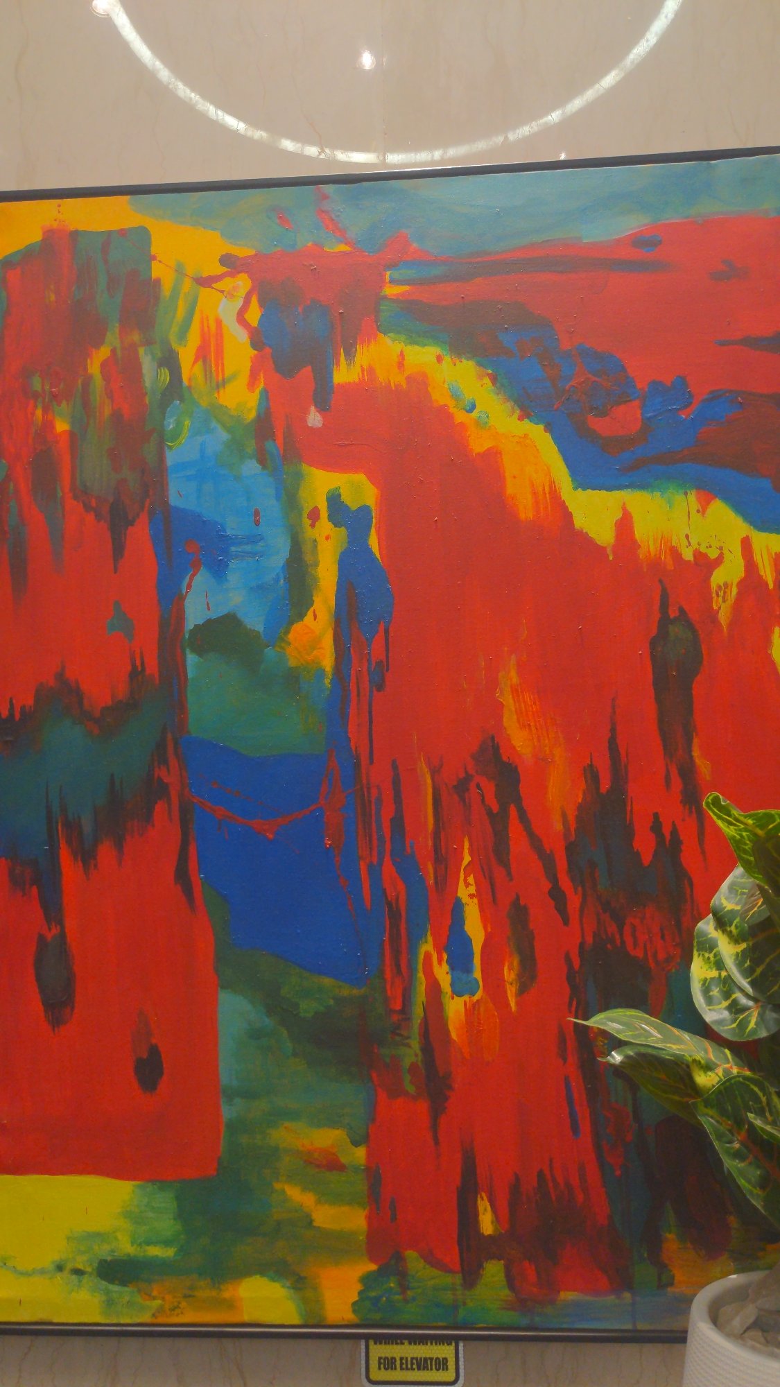 Abstract artwork displayed in modern Abuja interior space