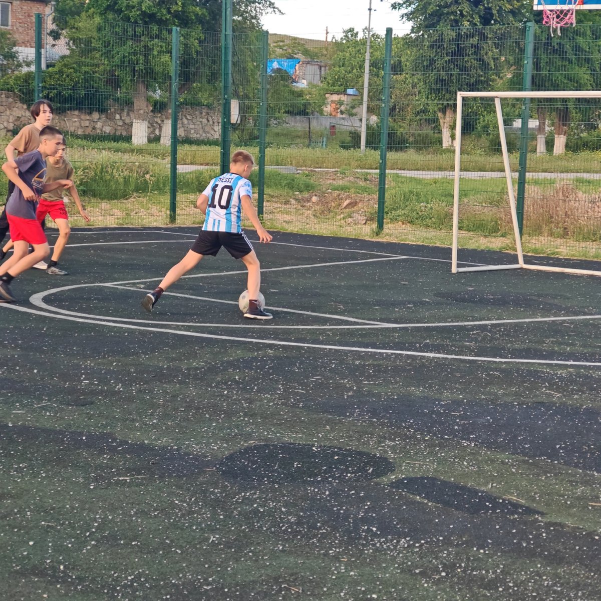 Soccer games and cycling observed in Ukrainian village