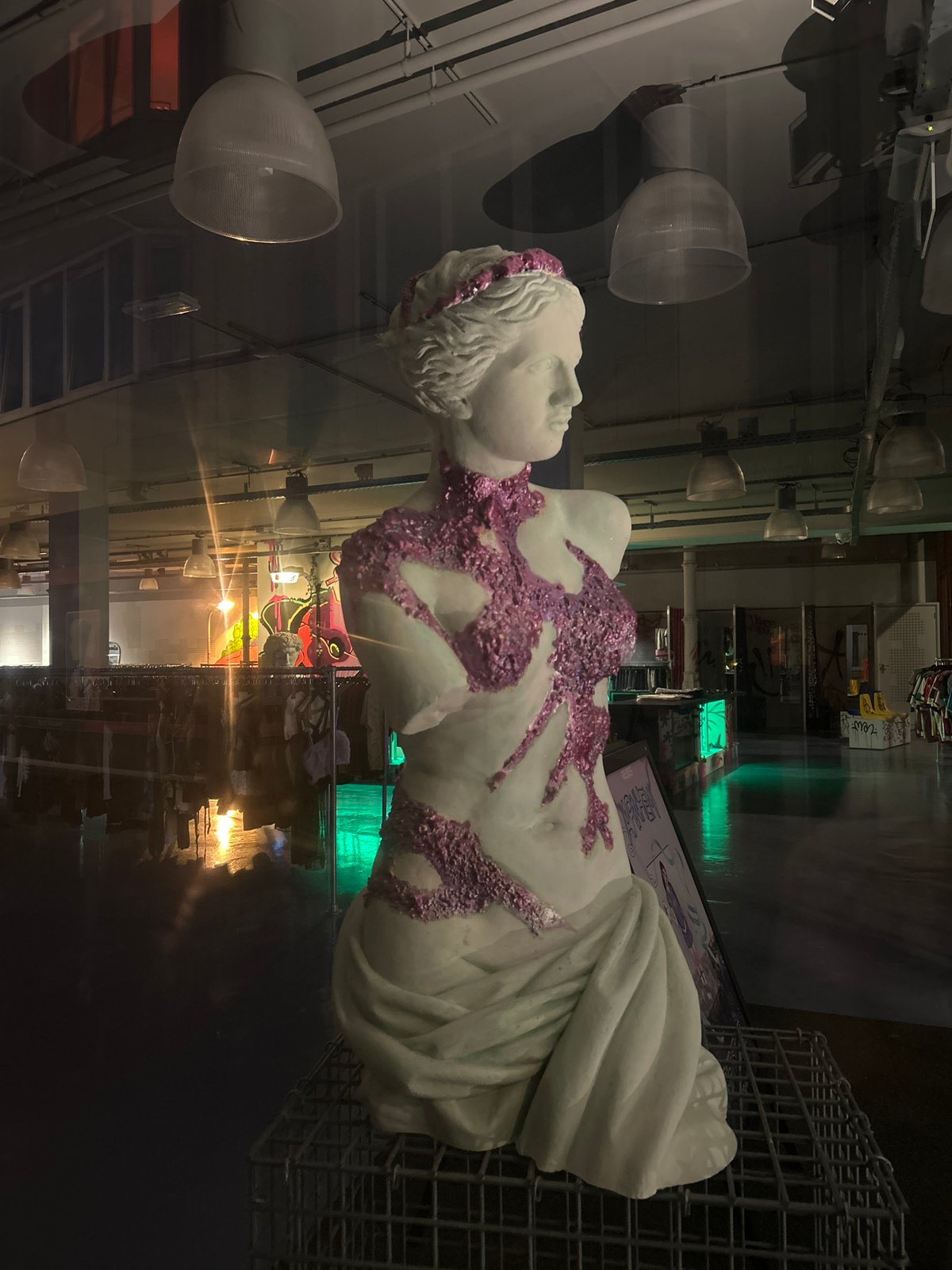 Marble sculpture with purple coral covering displayed in Arnhem