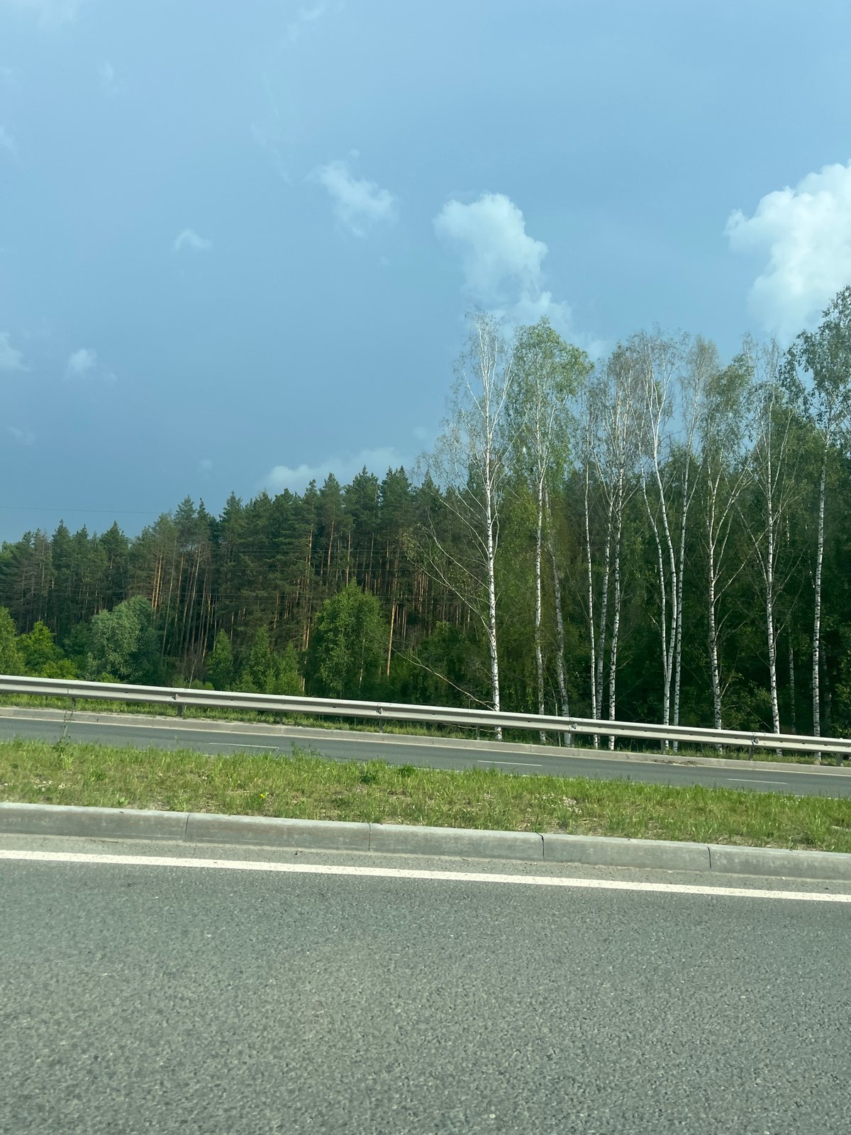 Highway through forested area in Zelenodol'sk, Russia