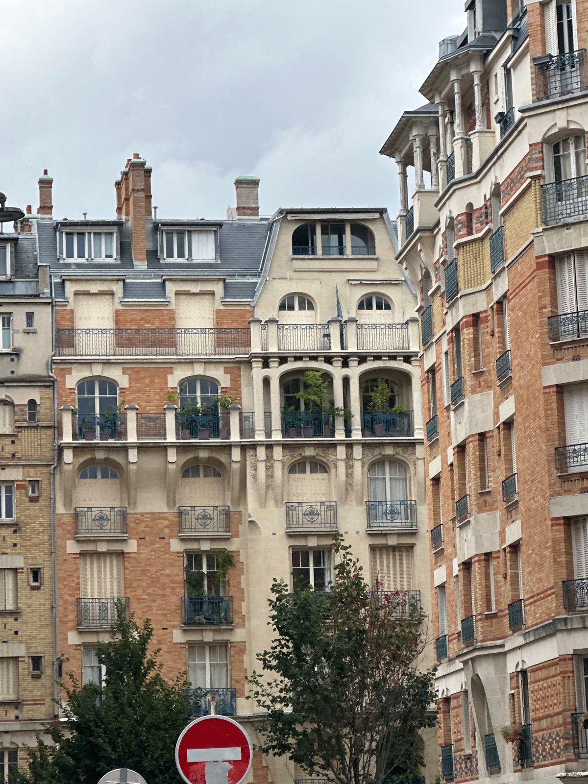 Paris street architecture and a very relaxed tabby cat