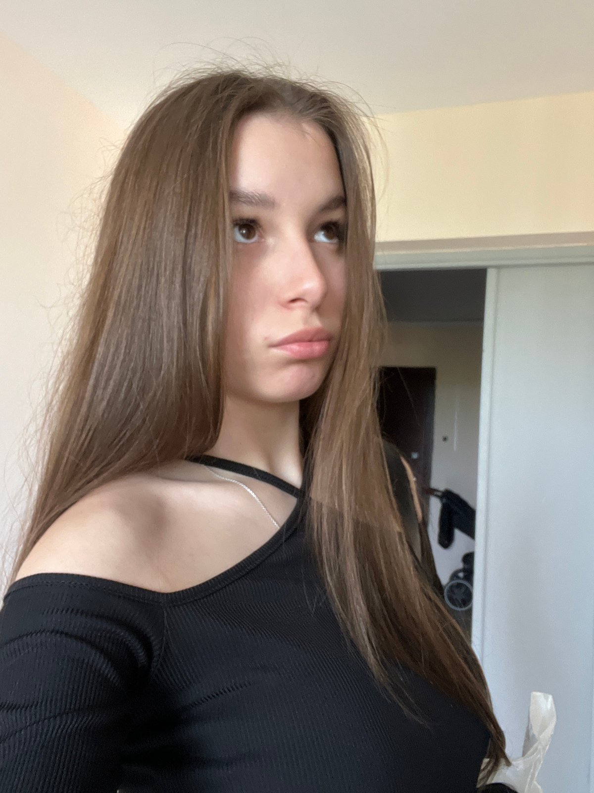 Woman takes selfie indoors in Chaikovsky, Russia