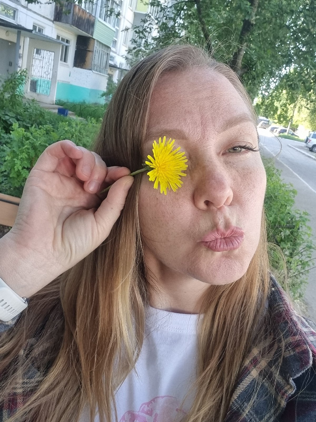 Women take casual photos in Chaikovsky during morning hours