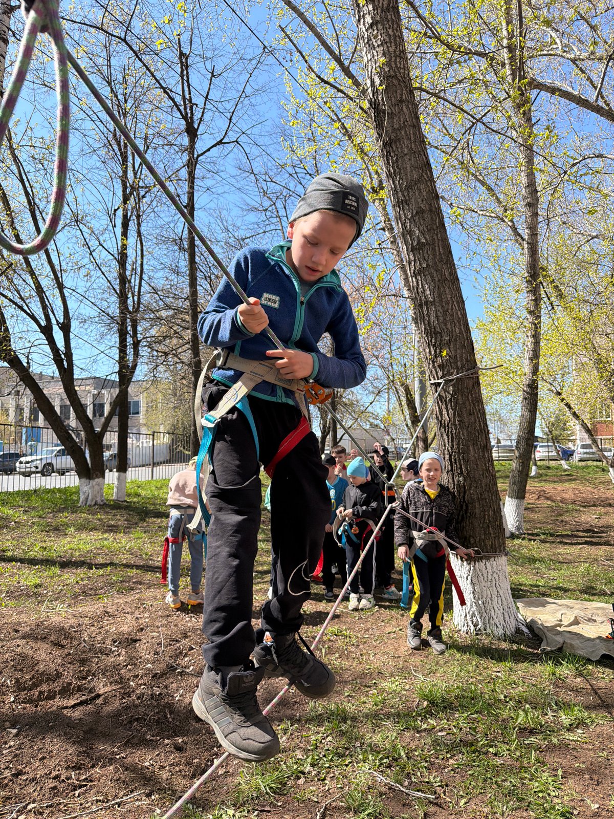 Children play and exercise in Izhevsk park morning
