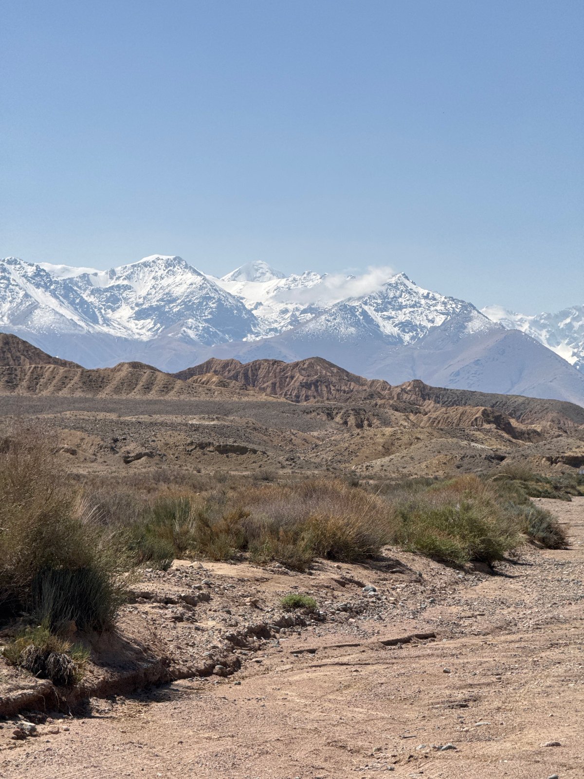 Morning lakeside tourism documented in remote Kyrgyzstan mountain region