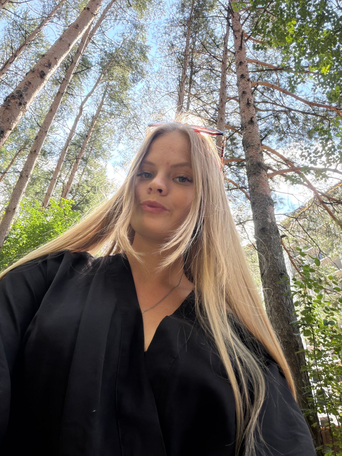 Selfie walk through a pine path in Izhevsk, Russia