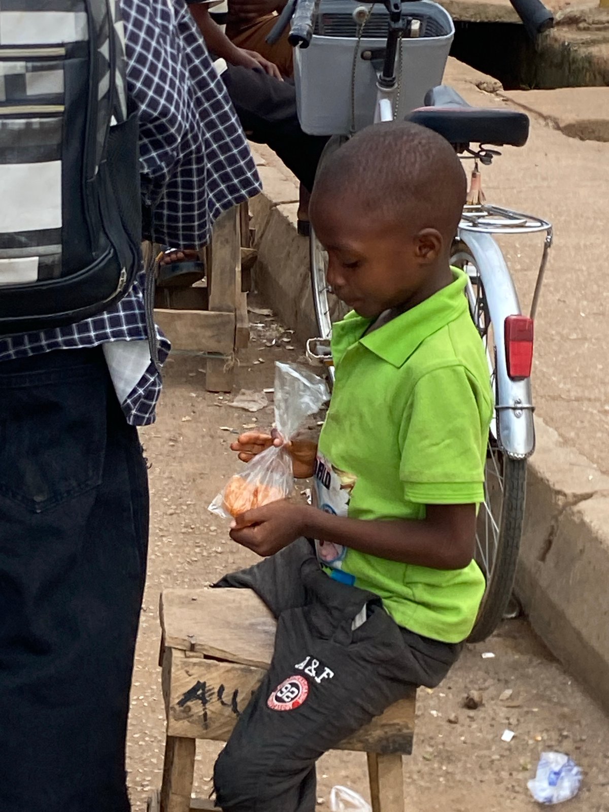 Bukuru market streets buzzing with vendors and foot traffic