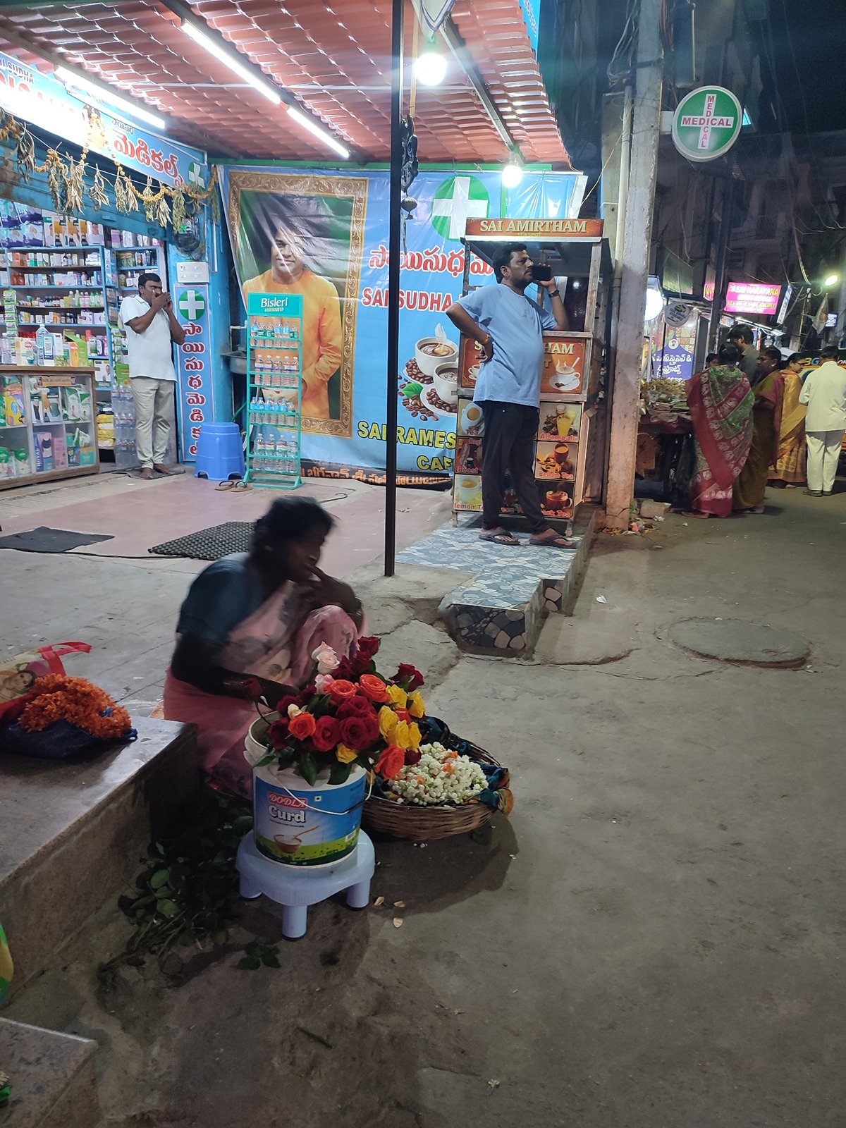 Daily street life documented in Puttaparthi temple district