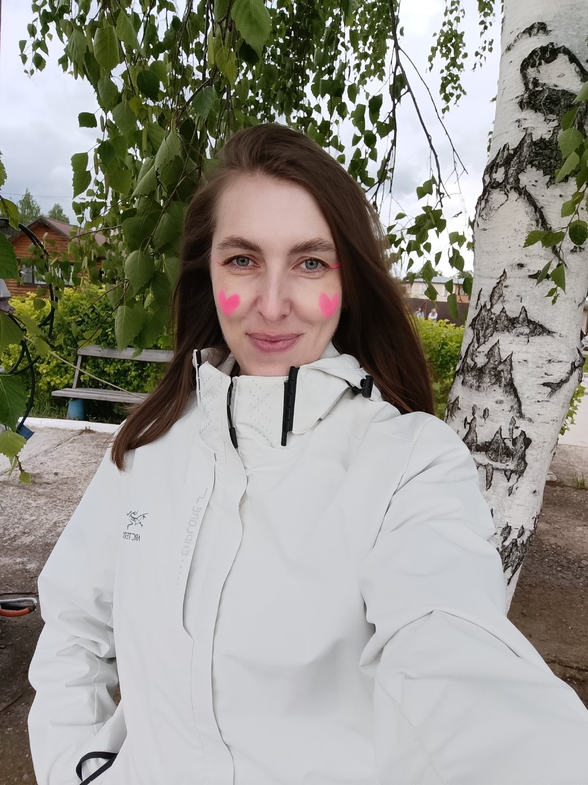 Couple explores park attractions in Chaikovsky, Russia with face paint