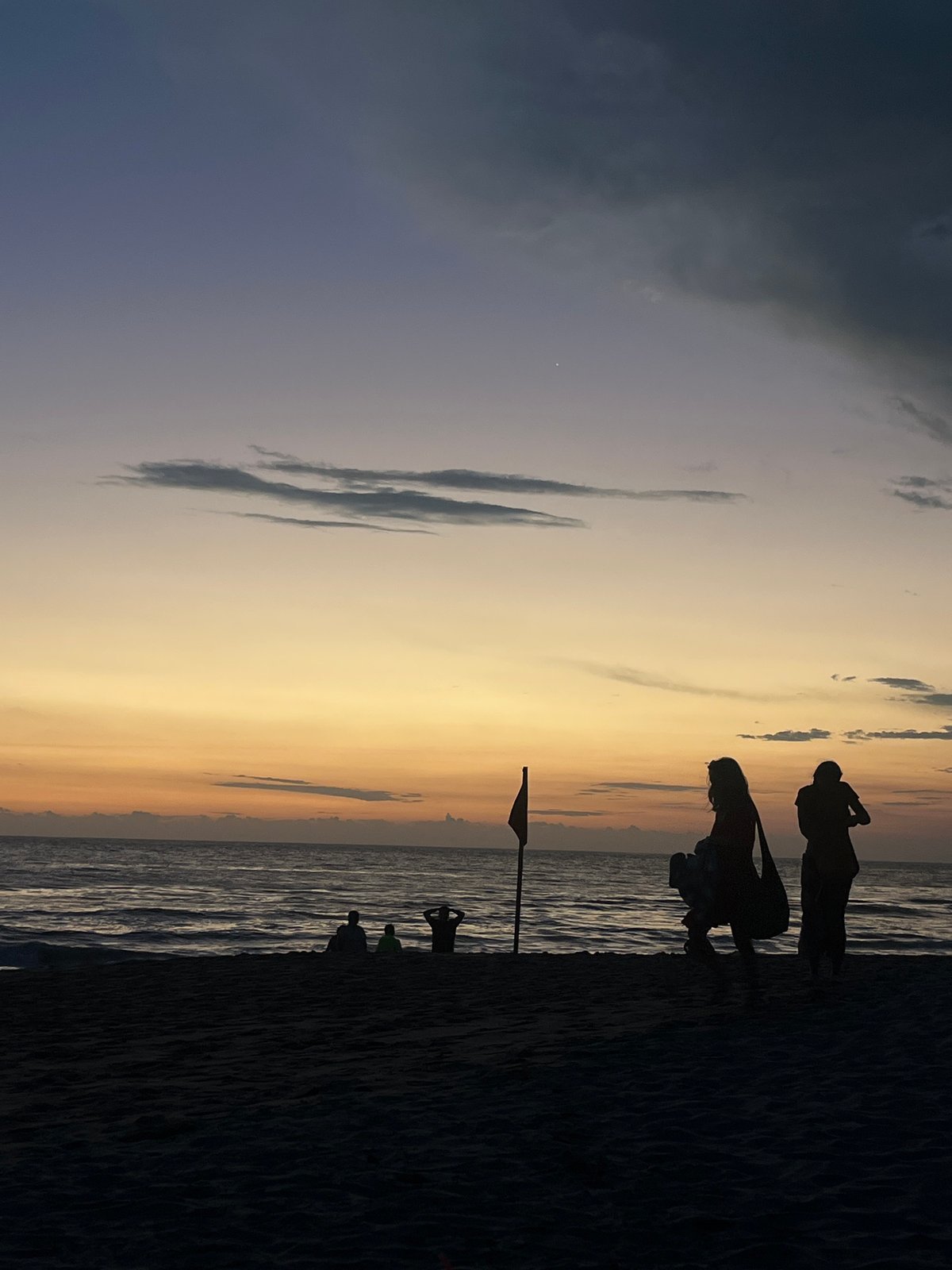 Evening beach activities documented at Brisas de Zicatela, Mexico