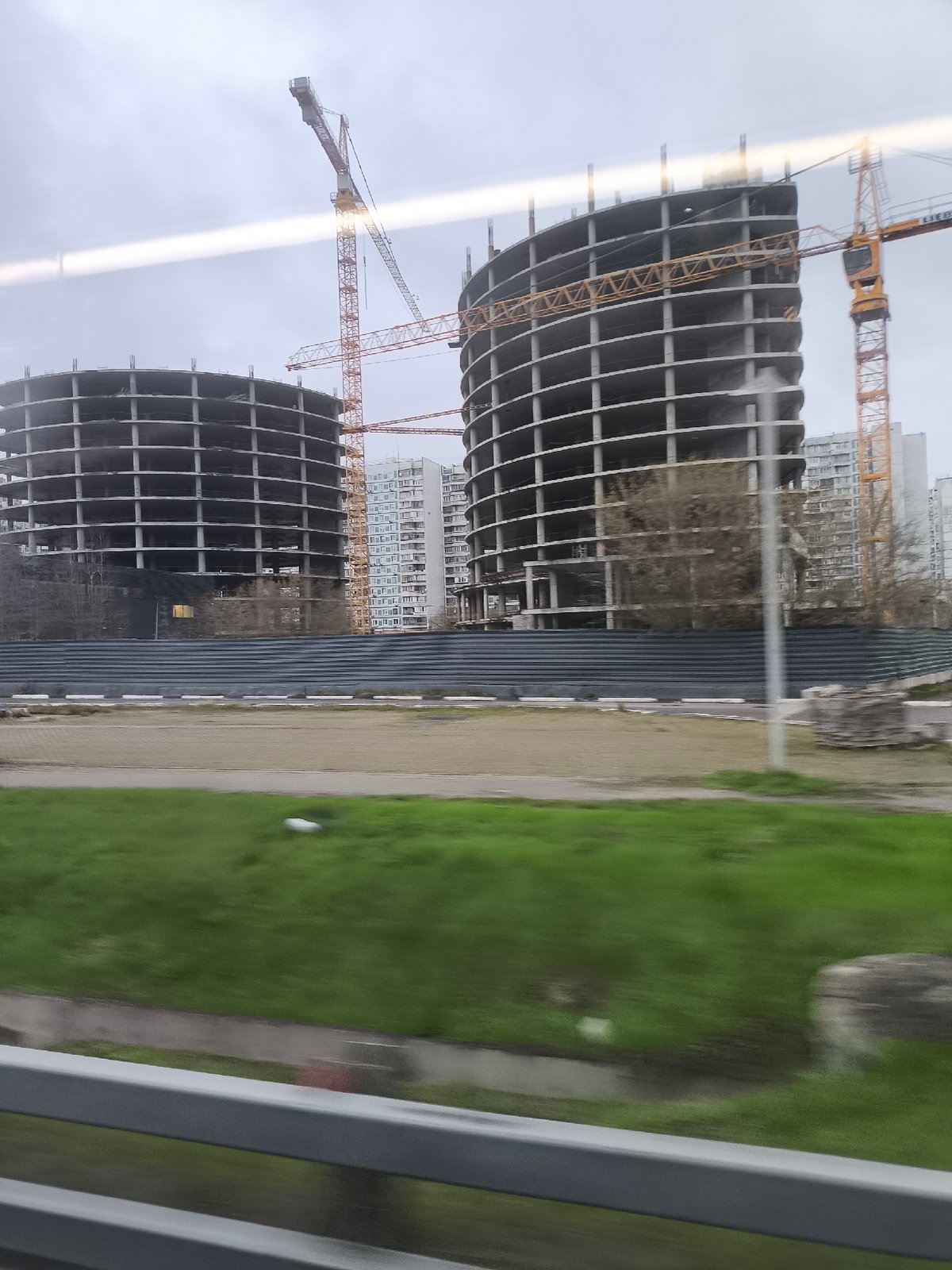 Circular concrete buildings under construction observed in Moscow