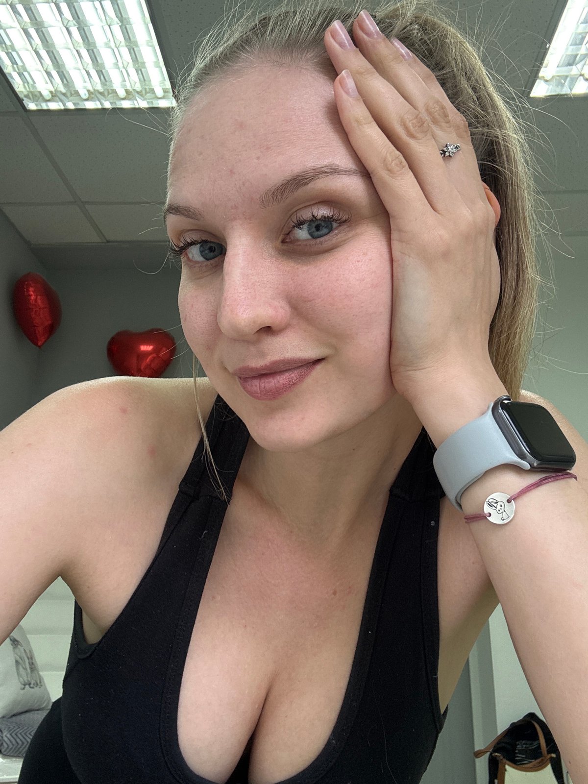 Young woman documents selfie session across Izhevsk locations