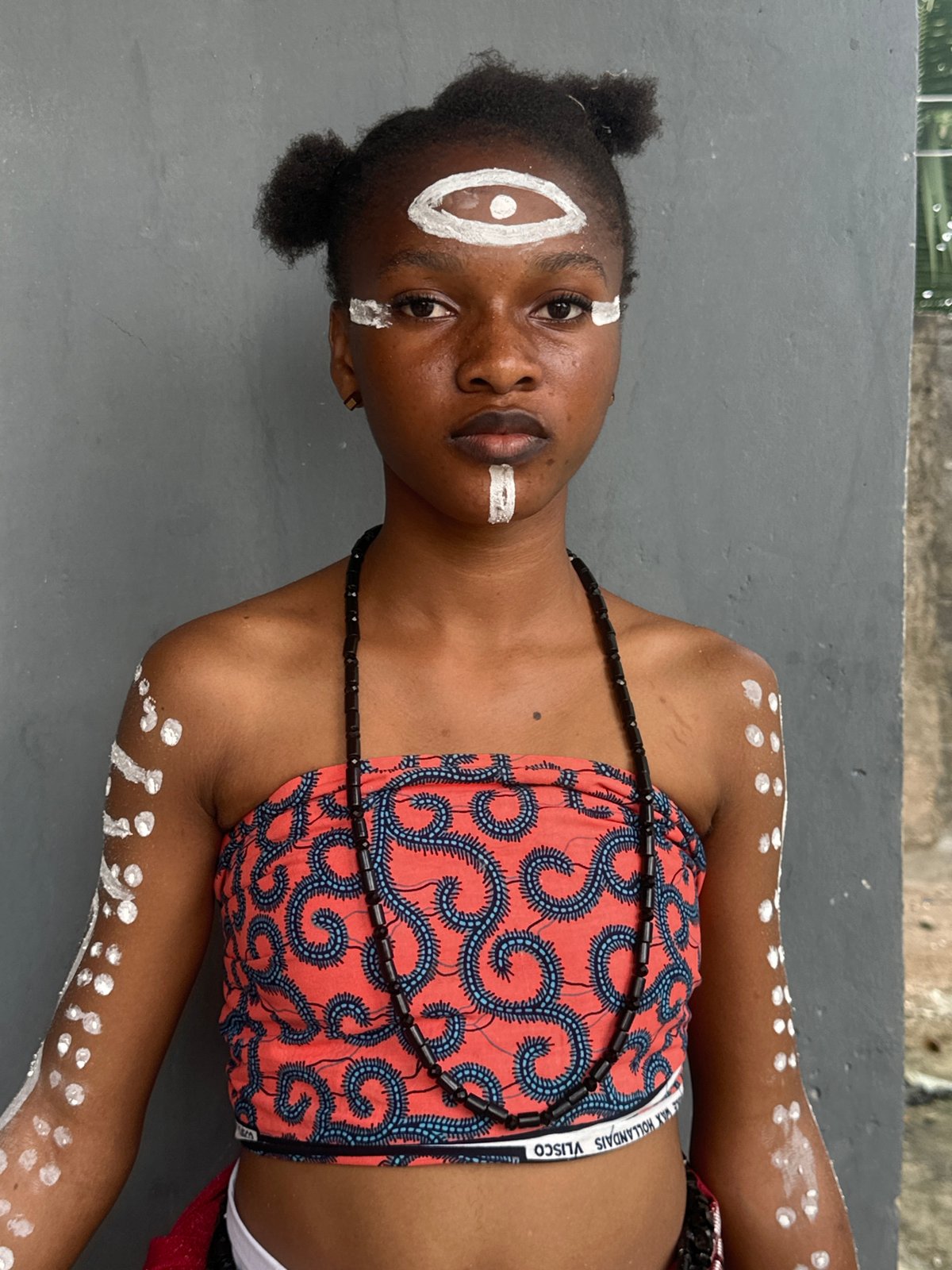 Traditional cultural ceremony with body paint in Badagry, Nigeria