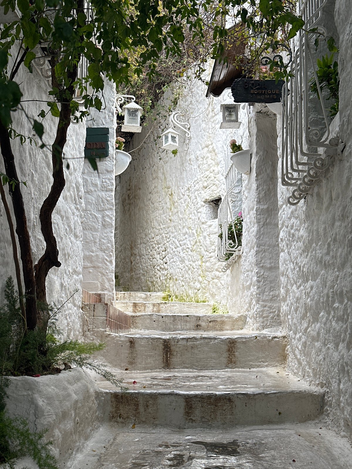Tourist documents afternoon stroll through Marmaris alleyways and marina