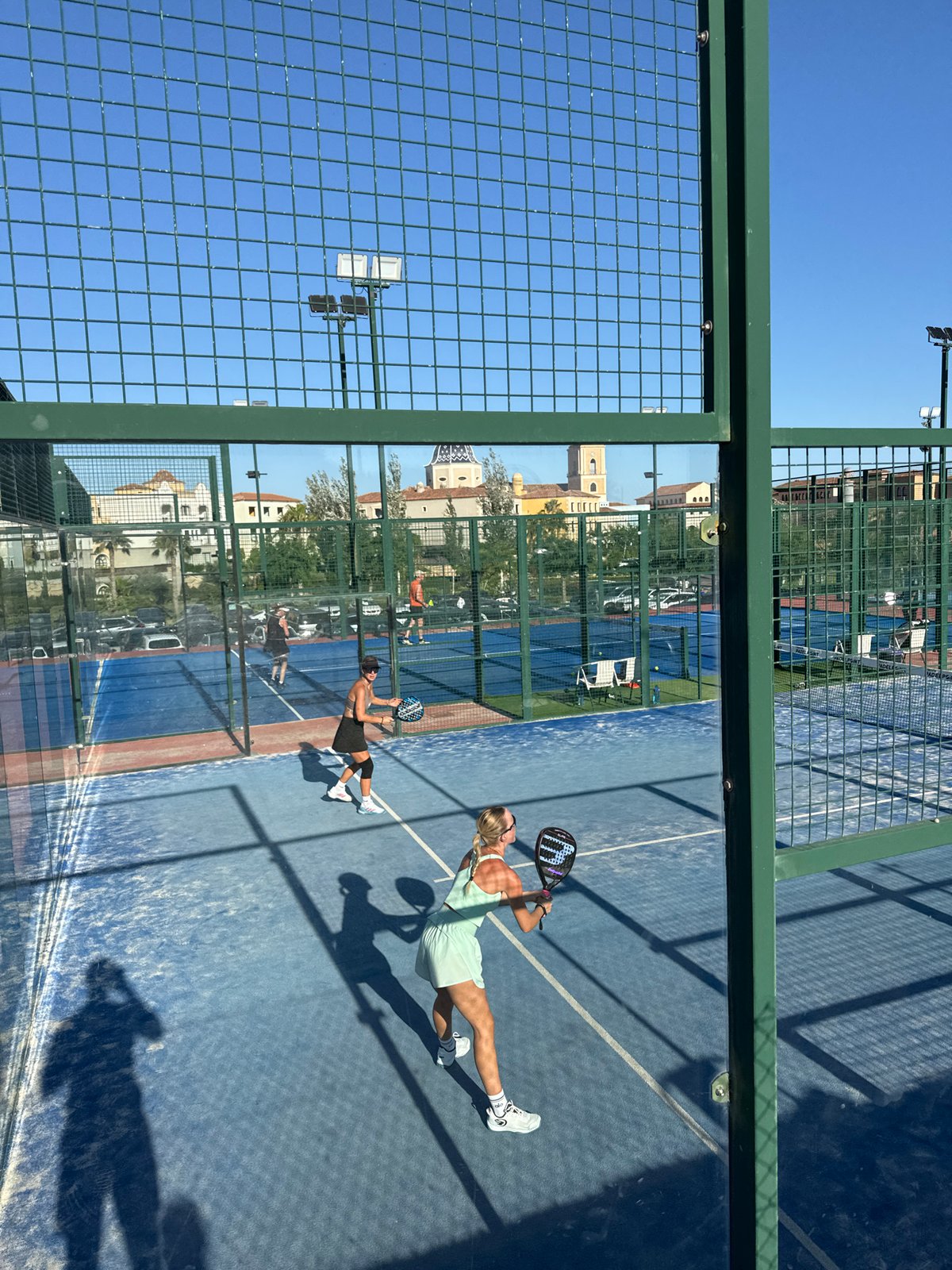 Afternoon padel at a Benidorm court with city and sea views