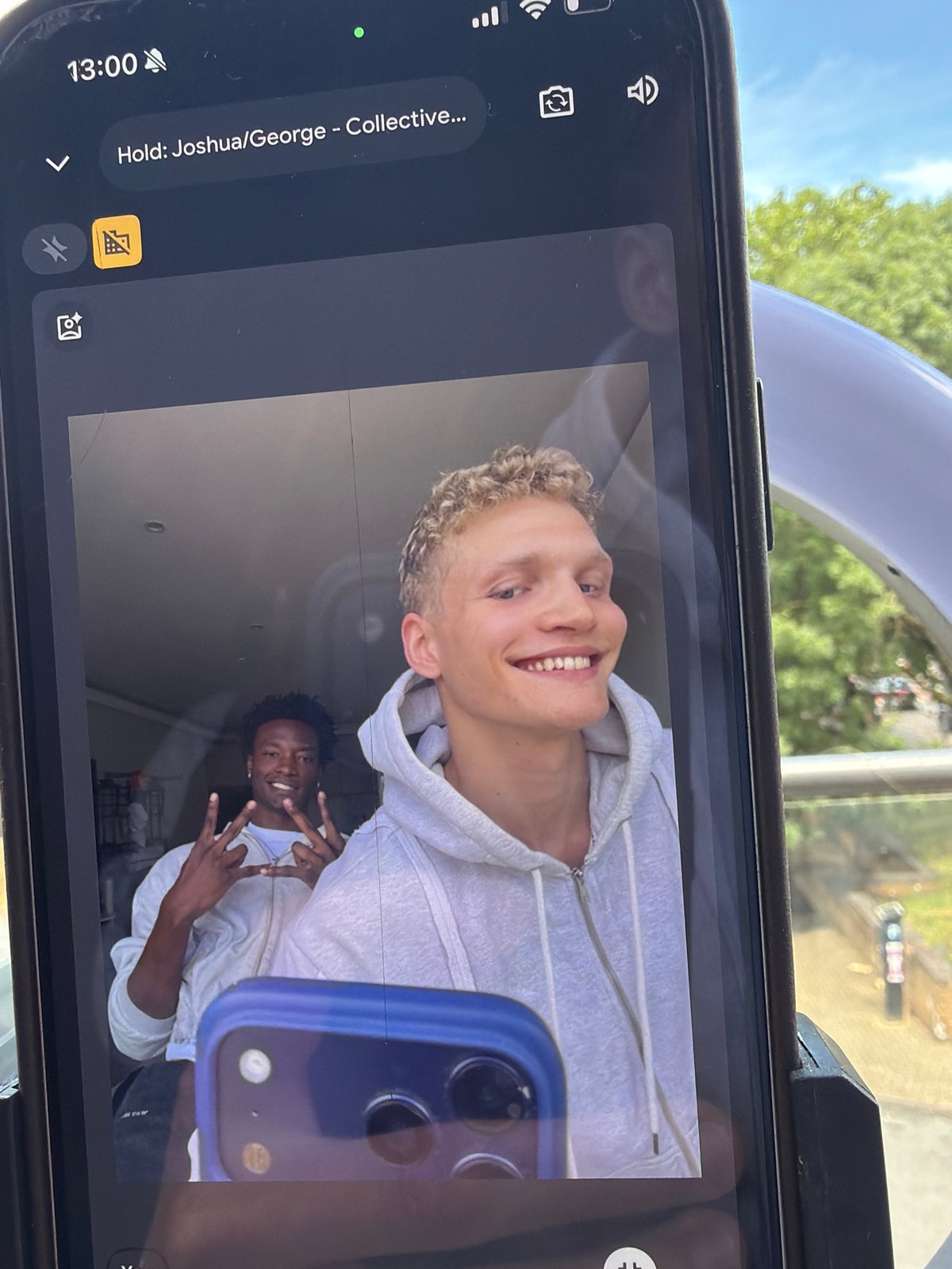 iPhone video call captured on car mount in London
