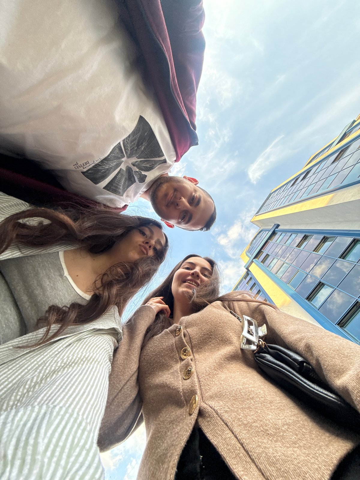 Young adults take casual selfies in Opole streets