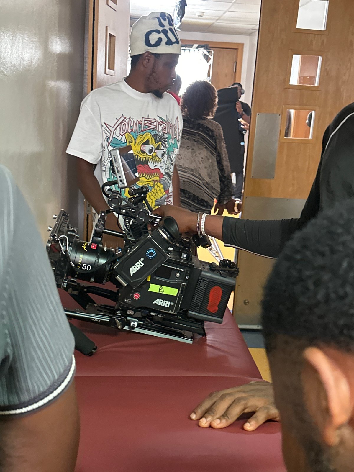 Film crew shoots indoor scene in Ilado, Nigeria