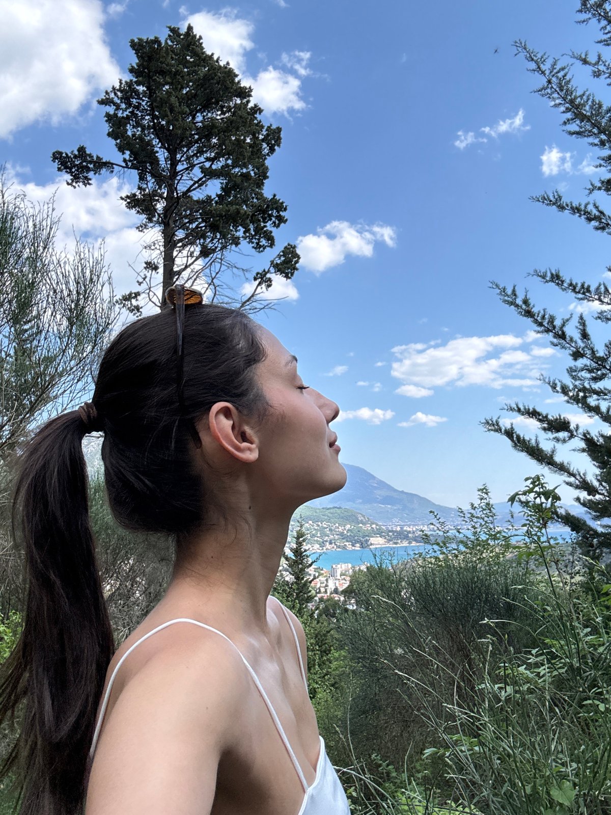 Woman spotted gazing at sky in Sutomore, Montenegro