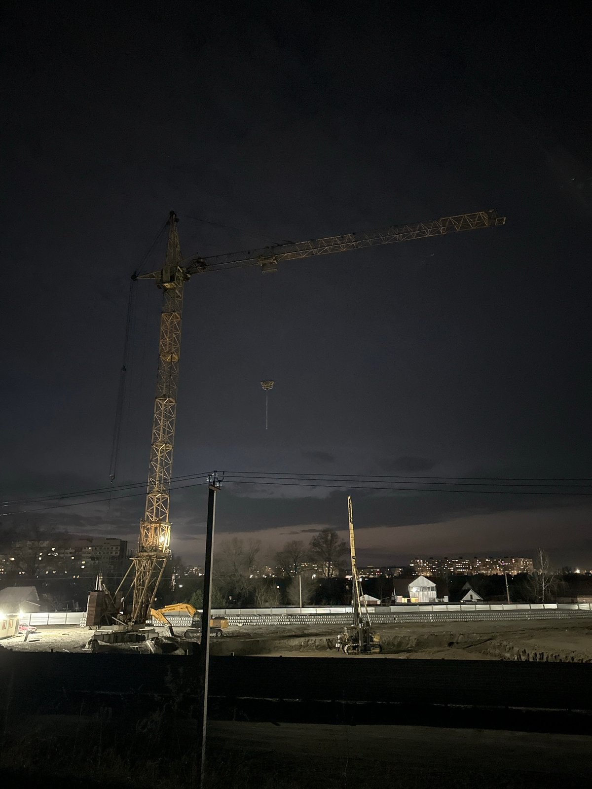 Night construction work observed in Biysk under crescent moon