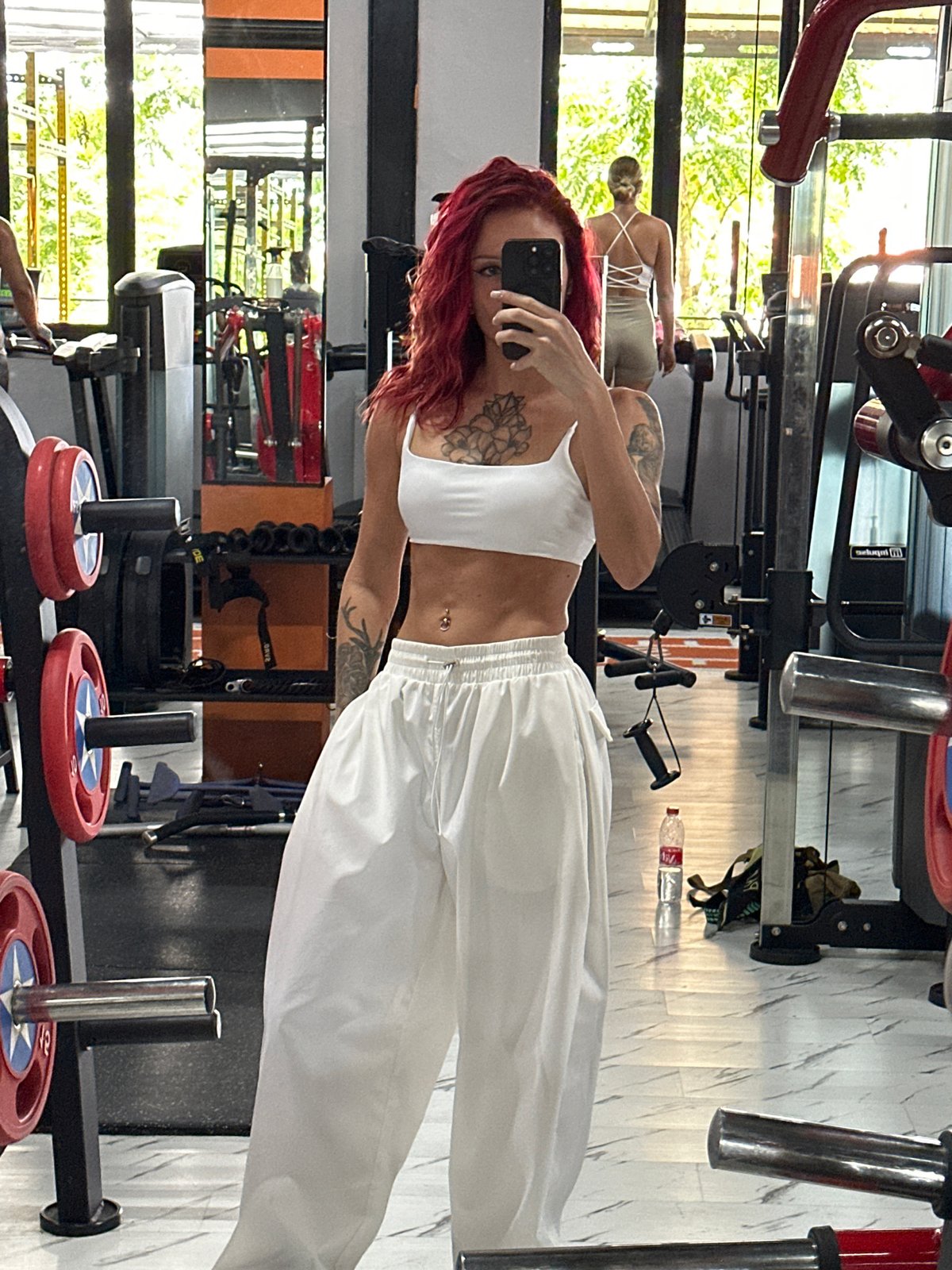 Woman takes gym selfie in North Kuta mirror