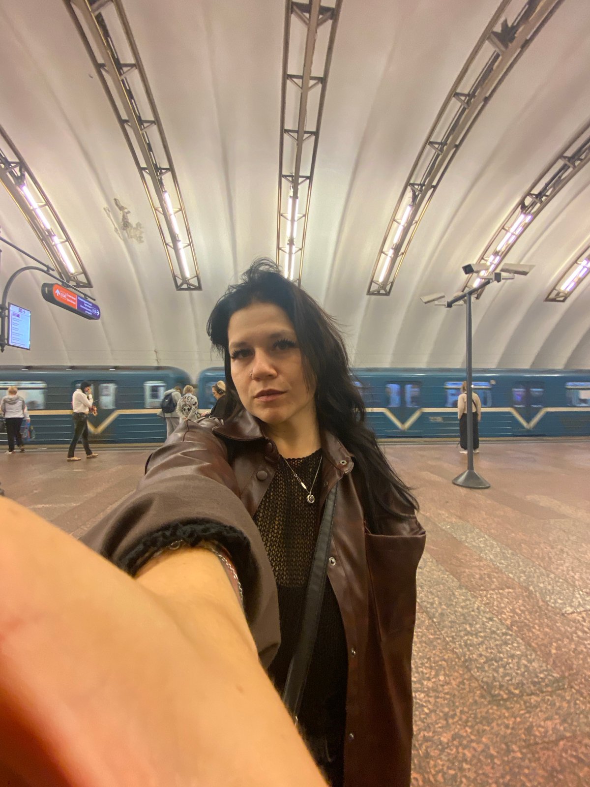 Selfies and platform shots at a Saint Petersburg metro stop