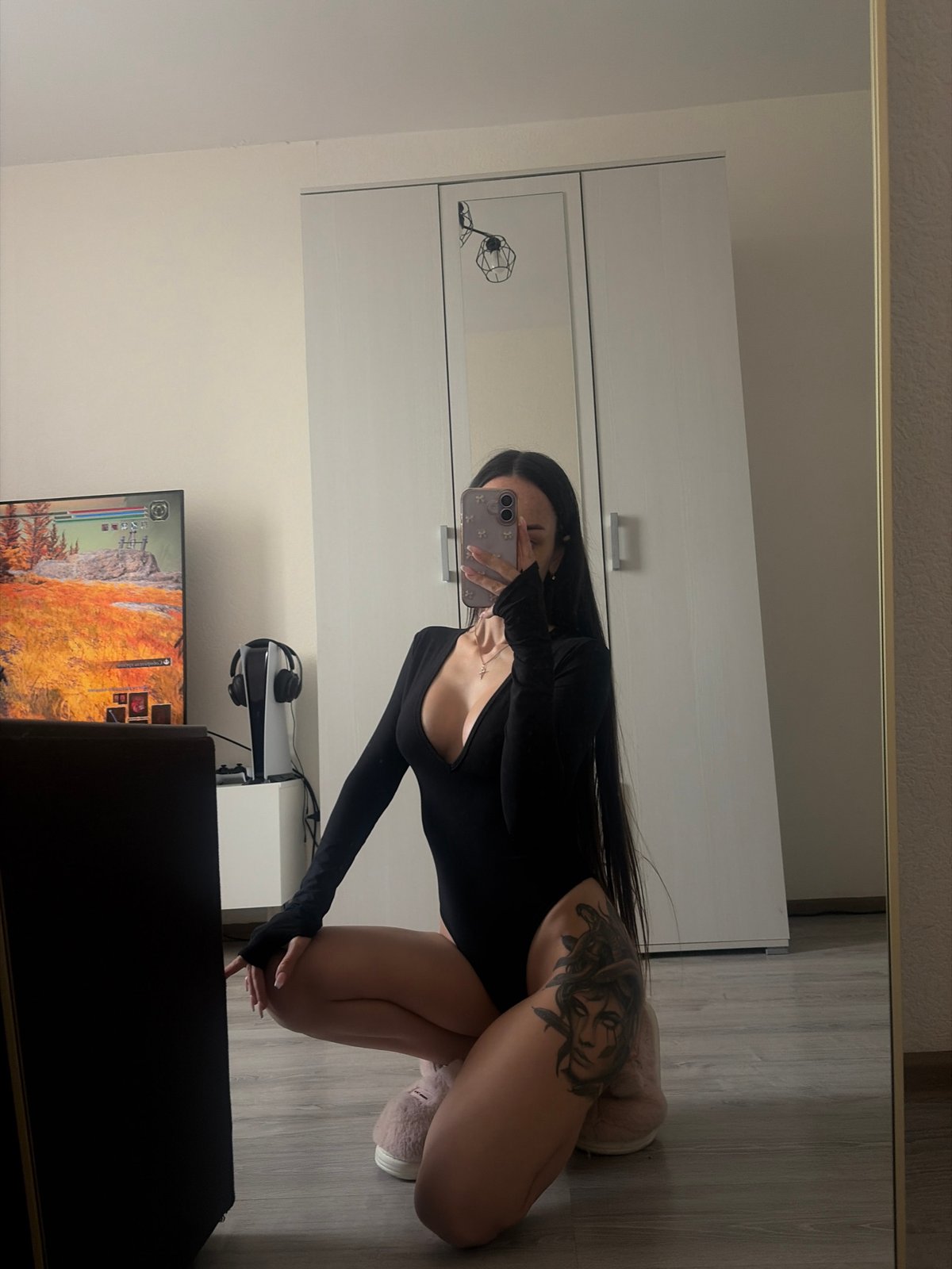 Woman takes mirror selfies in Saint Petersburg apartment