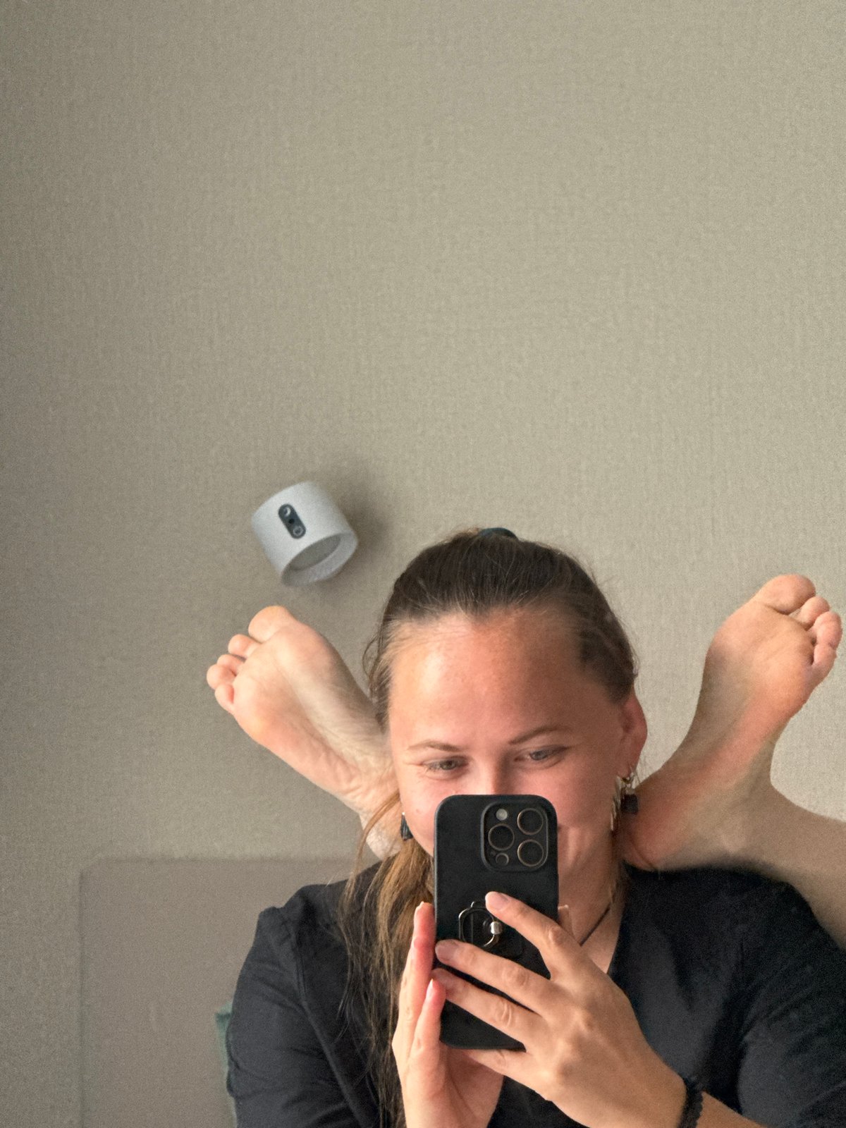 Woman takes selfies with smartphone in Izhevsk, Russia